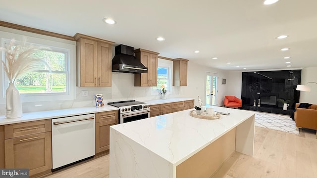 904 Man O War Ln, Great Falls, VA 22066 - kitchen with wall chimney range hood, white dishwasher, electric range, open floor plan, and healthy amount of natural light