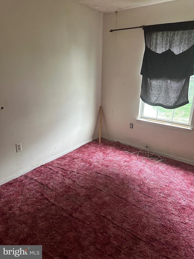 2407 E Rosecroft Village Cir, Oxon Hill, MD 20745 - carpeted spare room with baseboards