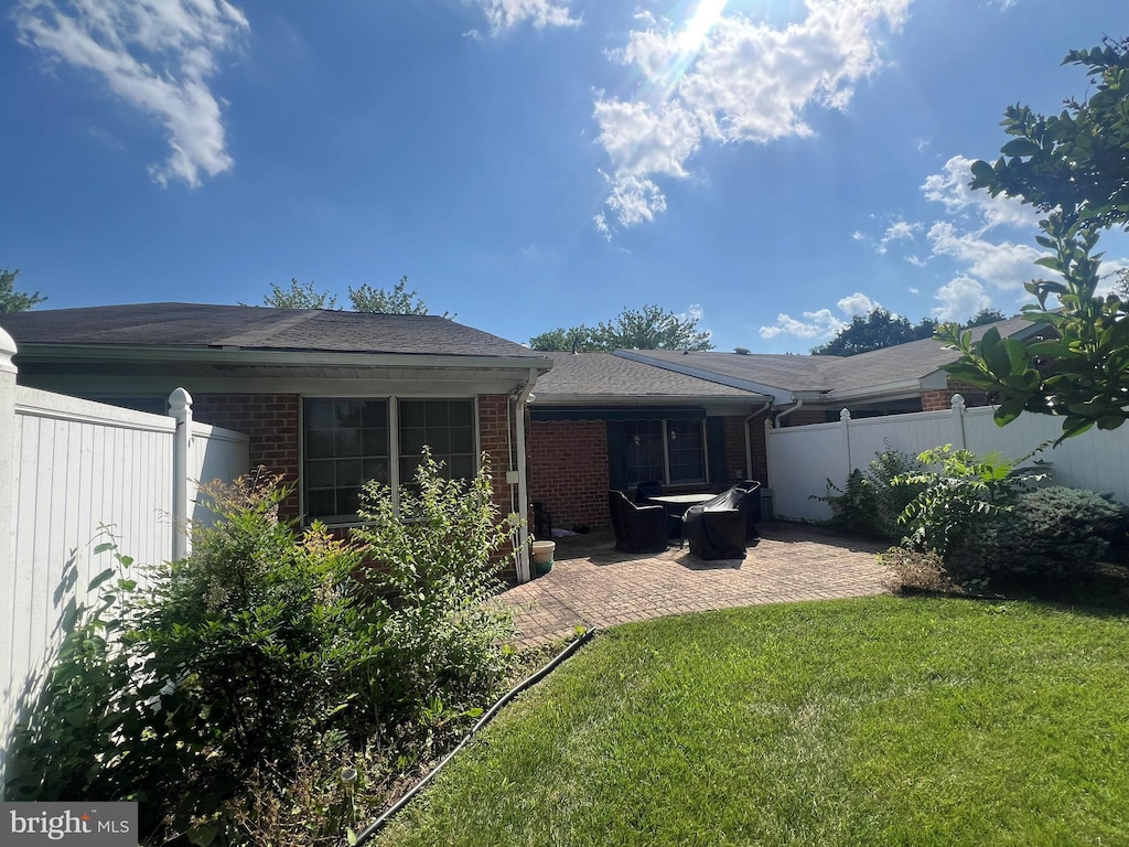 1038 Matthew Ct, Hagerstown, MD 21742 - rear view of property with a patio area and brick siding