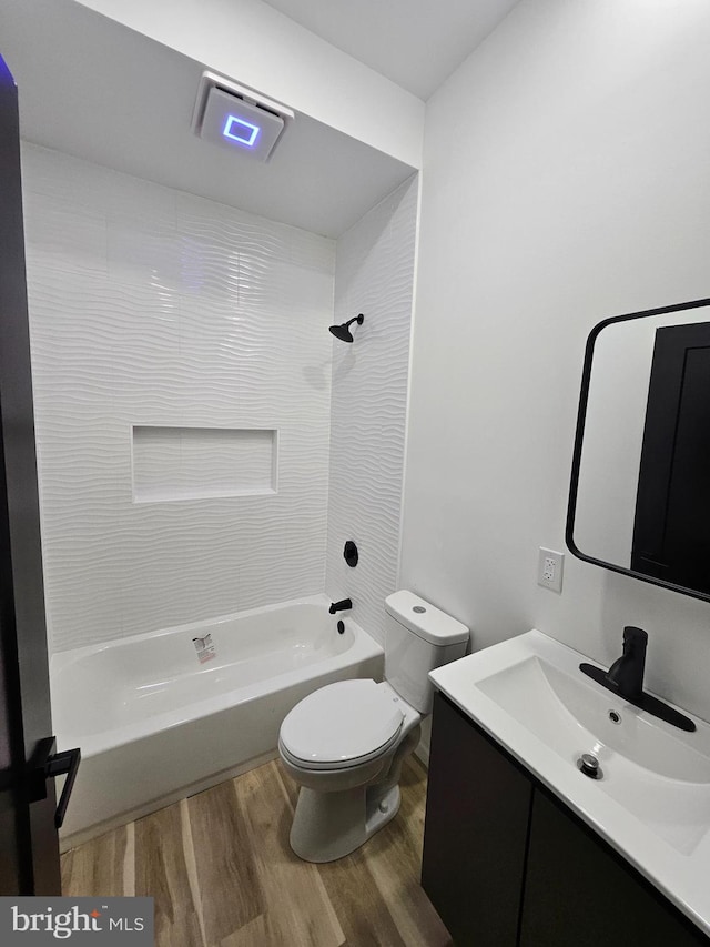 3239 N 13th St, Philadelphia, PA 19140 - full bath featuring wood finished floors, vanity, and  shower combination