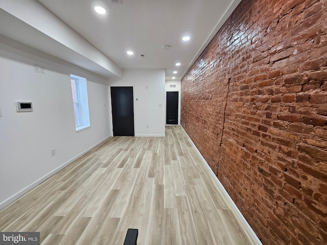 3239 N 13th St, Philadelphia, PA 19140 - spare room featuring brick wall, wood finished floors, and recessed lighting