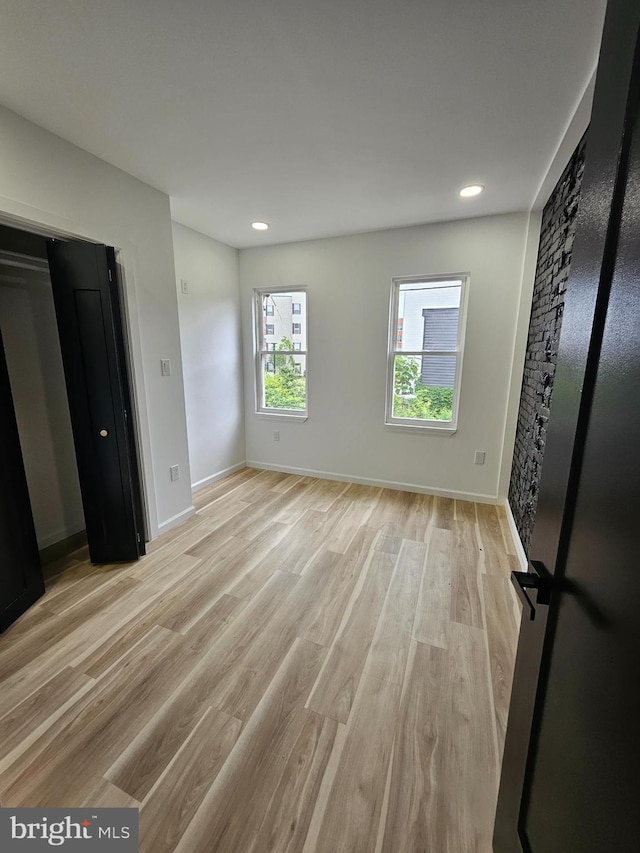 3239 N 13th St, Philadelphia, PA 19140 - unfurnished bedroom with light wood-type flooring and recessed lighting