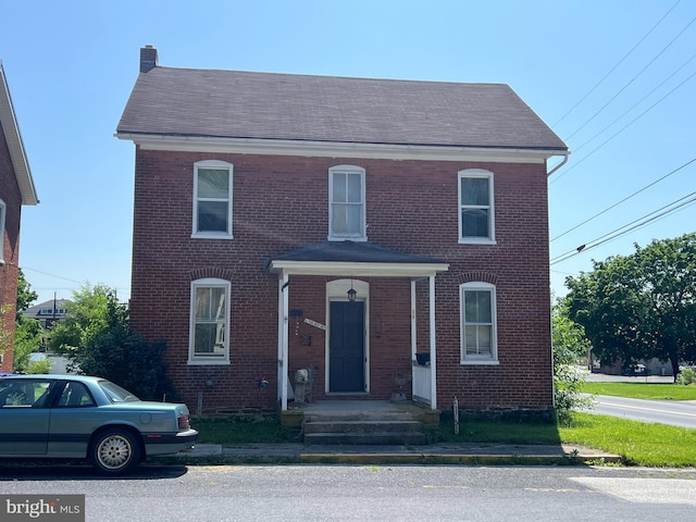 50 Penn St, Biglerville, PA 17307 - view of front of home with brick siding and a shingled roof