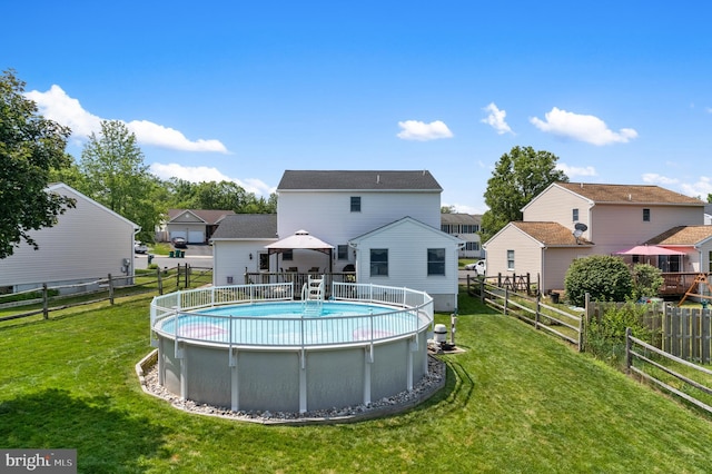 1015 Jodie Ct, Pennsburg, PA 18073 - rear view of house with a gazebo, a residential view, and a fenced backyard