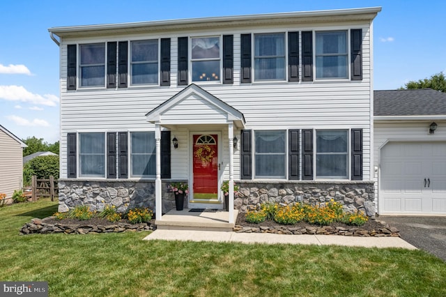 1015 Jodie Ct, Pennsburg, PA 18073 - view of front of home with stone siding and a garage