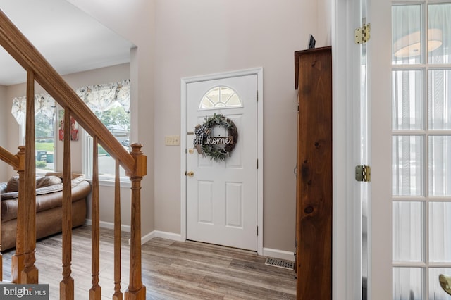 1015 Jodie Ct, Pennsburg, PA 18073 - foyer featuring light wood-style floors and stairway