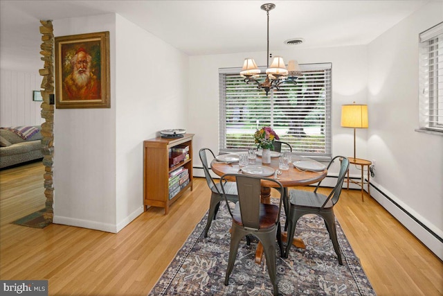1 High Acres Dr, Ewing, NJ 08628 - dining room with a chandelier, a baseboard heating unit, and light wood-style flooring