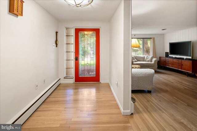 1 High Acres Dr, Ewing, NJ 08628 - foyer featuring a baseboard heating unit and light wood-type flooring