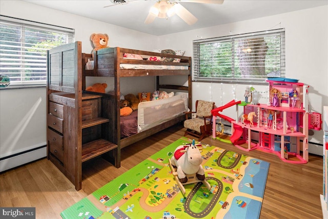 1 High Acres Dr, Ewing, NJ 08628 - bedroom with wood finished floors, a baseboard heating unit, and ceiling fan
