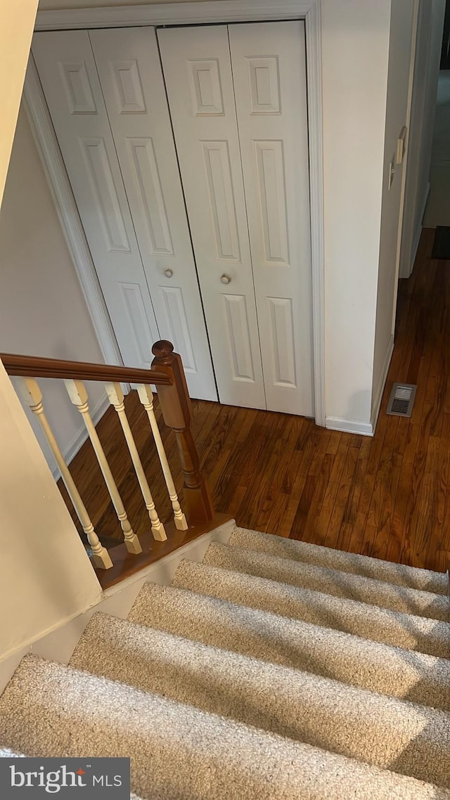 1402 Redwood Ct Unit 57, West Chester, PA 19380 - stairway with wood finished floors and baseboards