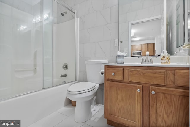 7330 Maple Ave Unit 116, Pennsauken, NJ 08109 - full bath with tile walls, tile patterned flooring, vanity, and shower / bath combination with glass door
