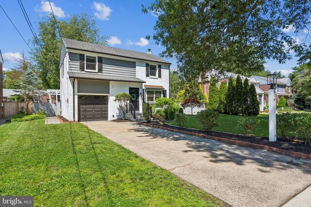 614 Radnor Ave, Haddonfield, NJ 08033 - view of front facade featuring an attached garage, driveway, and brick siding