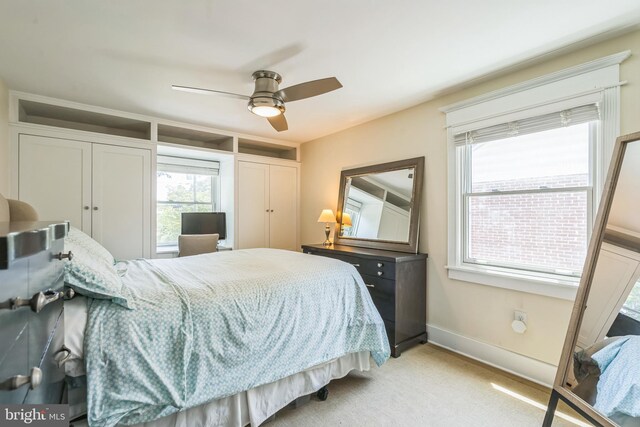 614 Radnor Ave, Haddonfield, NJ 08033 - bedroom featuring two closets, ceiling fan, and light carpet