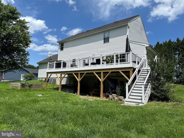 1267 Sheridan Dr, Owings, MD 20736 - back of property with a deck and stairs