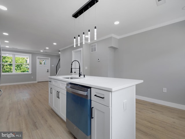 1759 Lyman Pl NE, Washington, DC 20002 - kitchen with dishwashing machine, ornamental molding, light wood-style floors, a kitchen island with sink, and white cabinets