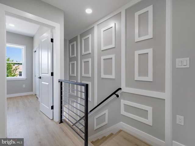 1759 Lyman Pl NE, Washington, DC 20002 - hallway with an upstairs landing, light wood-style flooring, and recessed lighting