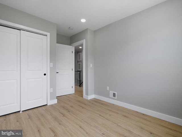 1759 Lyman Pl NE, Washington, DC 20002 - unfurnished bedroom with light wood-type flooring, a closet, and recessed lighting