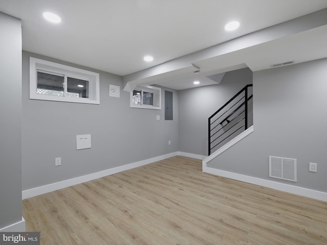1759 Lyman Pl NE, Washington, DC 20002 - finished below grade area with wood finished floors, electric panel, recessed lighting, and stairway