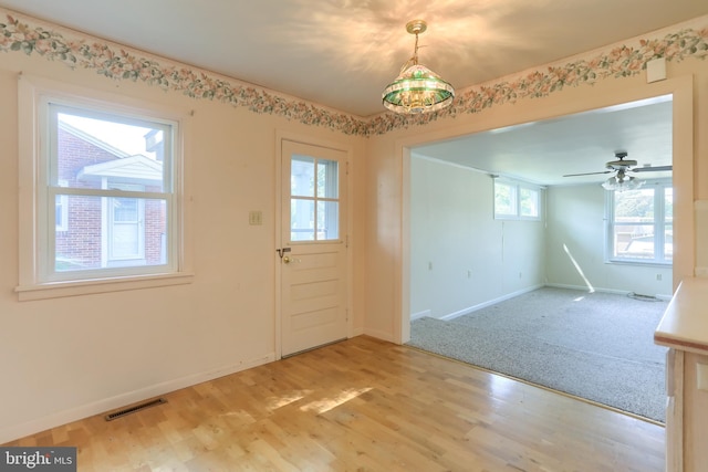 811 S Harrison St, Palmyra, PA 17078 - unfurnished dining area with light wood finished floors and a ceiling fan