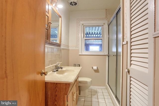 811 S Harrison St, Palmyra, PA 17078 - full bath with tile patterned floors, vanity, and a stall shower