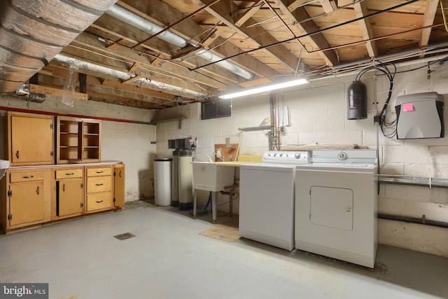 811 S Harrison St, Palmyra, PA 17078 - unfinished basement featuring washer and dryer, a water softener, and concrete block wall