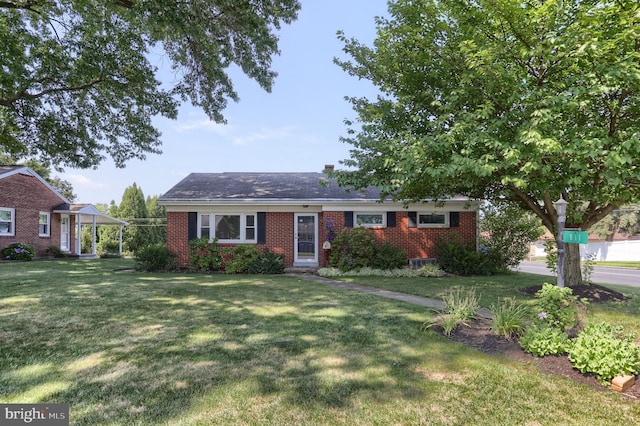 811 S Harrison St, Palmyra, PA 17078 - ranch-style house featuring brick siding, a front yard, and a carport