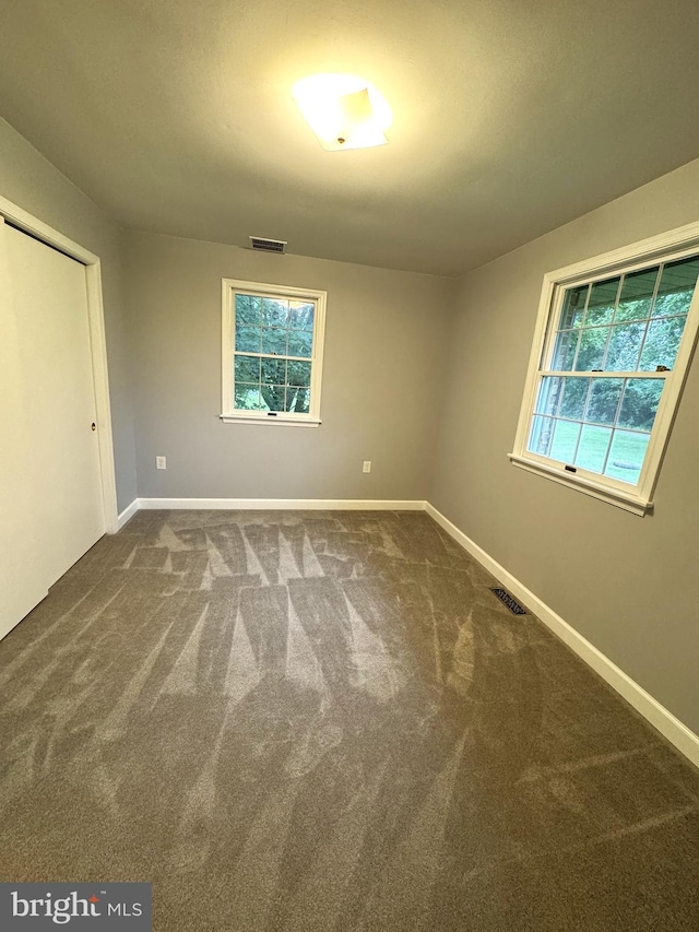 16611 Summers Ln, Brandywine, MD 20613 - spare room featuring healthy amount of natural light and carpet floors