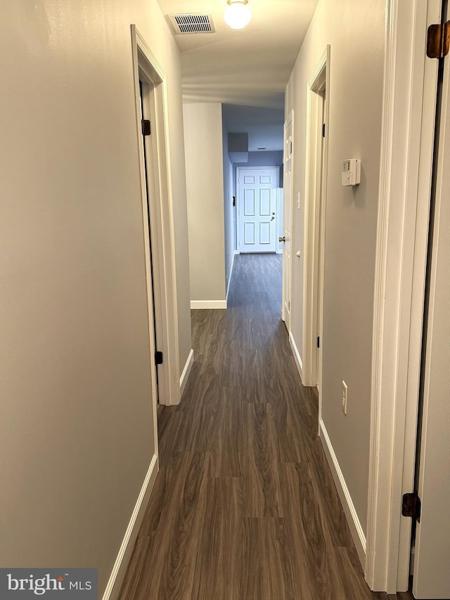 16611 Summers Ln, Brandywine, MD 20613 - hall featuring dark wood-type flooring and baseboards