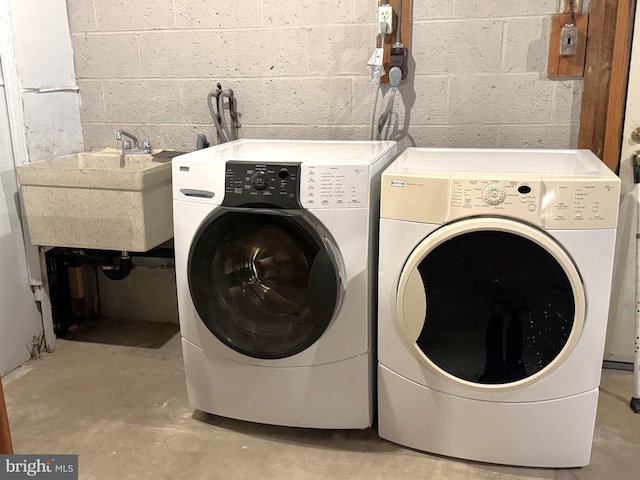 16611 Summers Ln, Brandywine, MD 20613 - laundry room with independent washer and dryer and concrete block wall