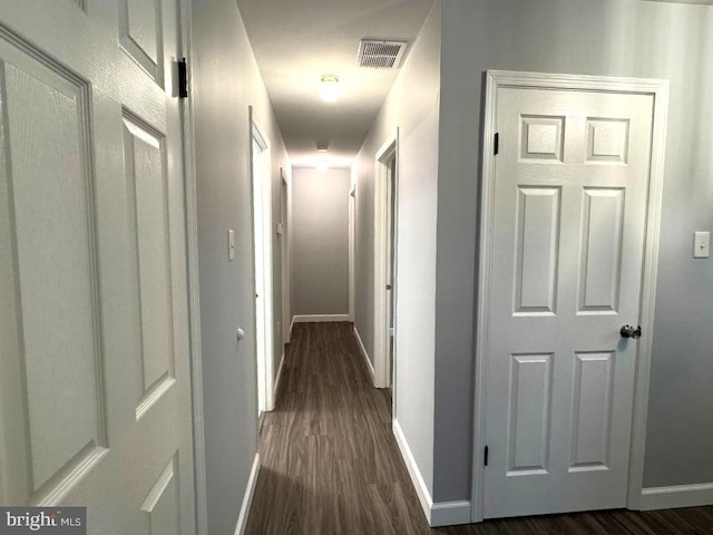 16611 Summers Ln, Brandywine, MD 20613 - hall with baseboards and dark wood finished floors