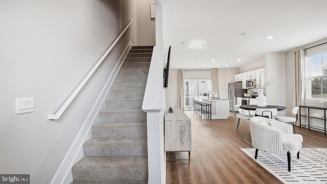 176 Munsee Cir, Winchester, VA 22602 - stairs with wood finished floors and recessed lighting