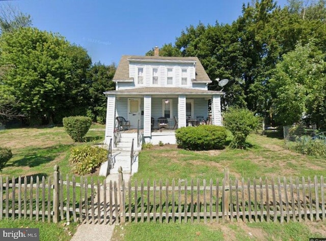 1635 Ninth, Ewing, NJ 08638 - view of front of home featuring covered porch and a chimney