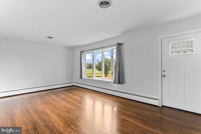 158 Firetower Rd, Port Deposit, MD 21904 - entrance foyer with wood finished floors and a baseboard radiator