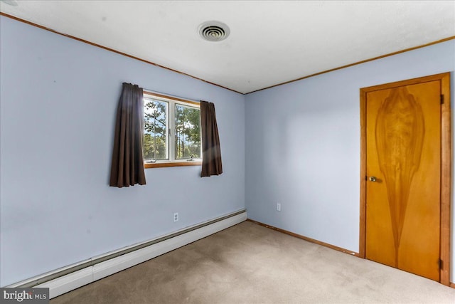 158 Firetower Rd, Port Deposit, MD 21904 - empty room featuring a baseboard radiator, light colored carpet, and crown molding