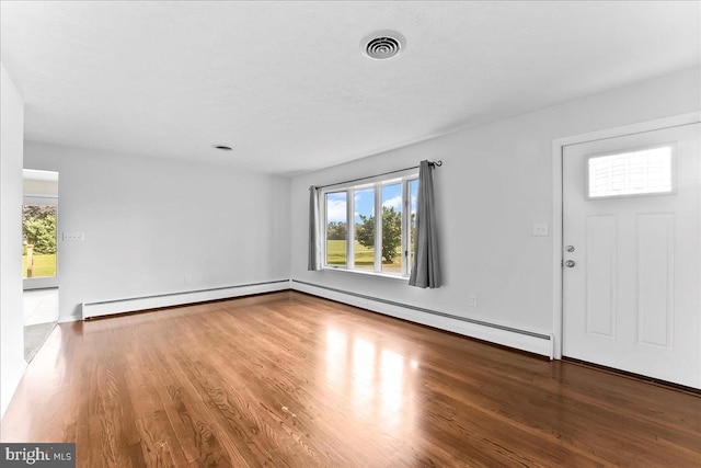 158 Firetower Rd, Port Deposit, MD 21904 - entrance foyer with healthy amount of natural light, wood finished floors, and baseboard heating
