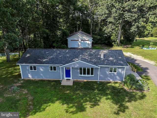 158 Firetower Rd, Port Deposit, MD 21904 - ranch-style home featuring a detached garage, an outbuilding, a front lawn, and a shingled roof