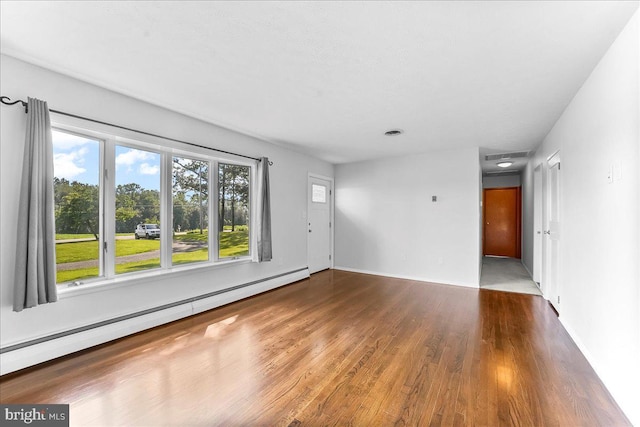158 Firetower Rd, Port Deposit, MD 21904 - unfurnished living room featuring baseboard heating and wood finished floors