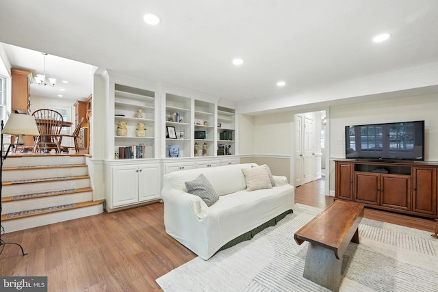 8201 Briar Creek Dr, Annandale, VA 22003 - living area featuring light wood-style flooring, a chandelier, recessed lighting, and crown molding