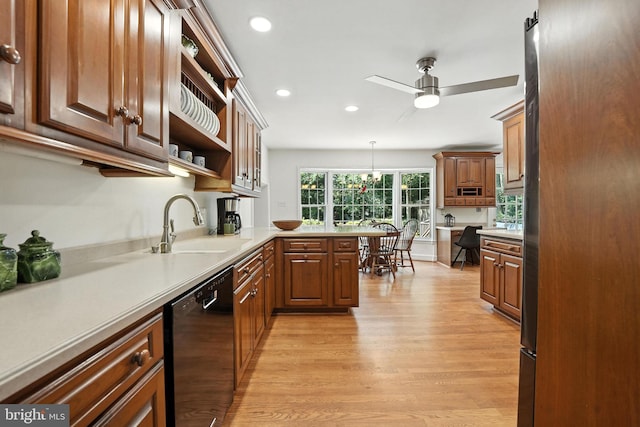 8201 Briar Creek Dr, Annandale, VA 22003 - kitchen featuring black dishwasher, light wood finished floors, open shelves, recessed lighting, and a peninsula