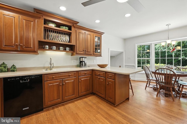 8201 Briar Creek Dr, Annandale, VA 22003 - kitchen with dishwasher, a peninsula, open shelves, brown cabinetry, and light wood-style floors