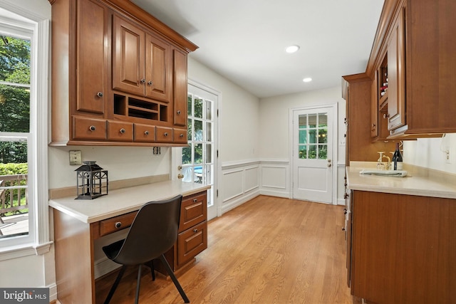 8201 Briar Creek Dr, Annandale, VA 22003 - office space featuring light wood-type flooring, built in study area, a wainscoted wall, and recessed lighting