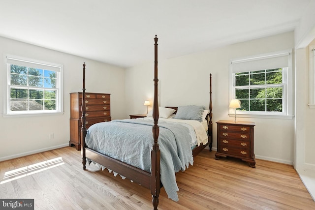 8201 Briar Creek Dr, Annandale, VA 22003 - bedroom with light wood finished floors and baseboards