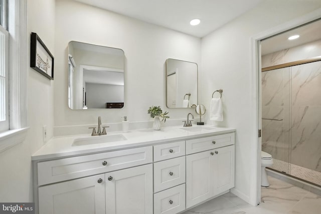 8201 Briar Creek Dr, Annandale, VA 22003 - full bathroom with marble look tiles, a marble finish shower, double vanity, and recessed lighting