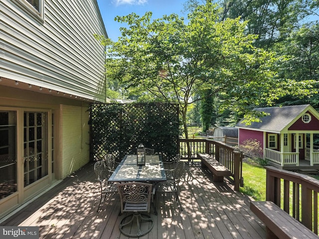 8201 Briar Creek Dr, Annandale, VA 22003 - deck with an outdoor structure and outdoor dining space