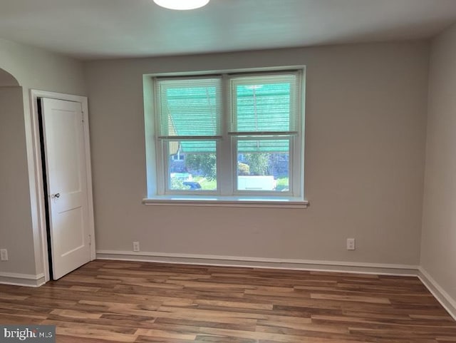 3019 Magee Ave, Philadelphia, PA 19149 - unfurnished room with wood finished floors and arched walkways