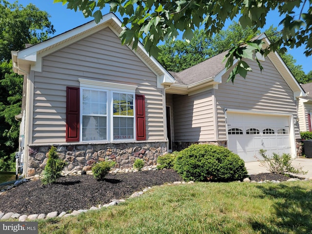 29 Hearthstone Blvd, Pemberton, NJ 08068 - ranch-style home featuring a garage, stone siding, and driveway