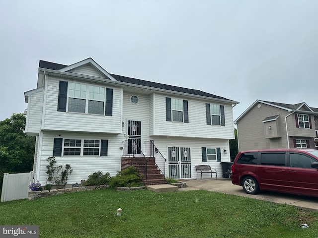 95 Buchanan Ln, Inwood, WV 25428 - bi-level home featuring a front lawn