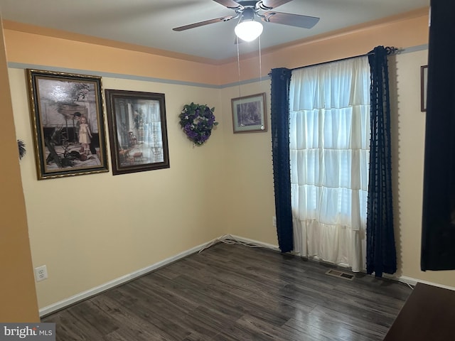95 Buchanan Ln, Inwood, WV 25428 - empty room with dark wood finished floors and ceiling fan