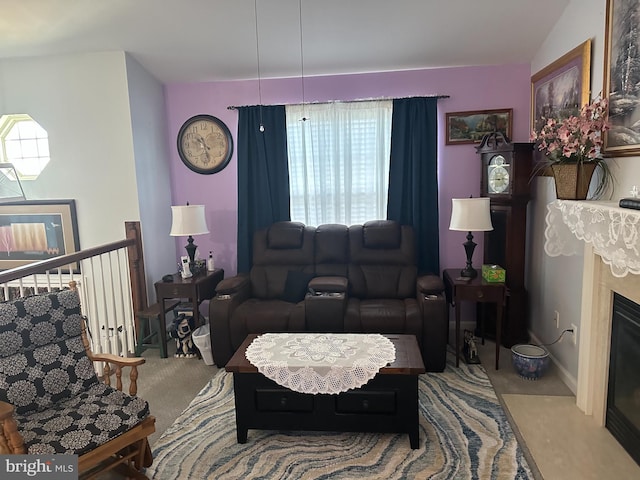 95 Buchanan Ln, Inwood, WV 25428 - living room with a glass covered fireplace and carpet
