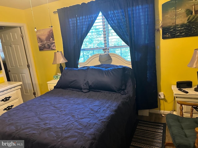 95 Buchanan Ln, Inwood, WV 25428 - bedroom featuring wood finished floors and baseboards